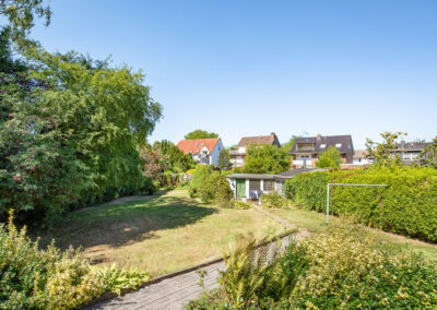 Großer Garten und kleiner Schuppen zum einseitig angebauten Bungalow mit ausbaufähigem Dachgeschoss in Gladbeck-Rosenhügel